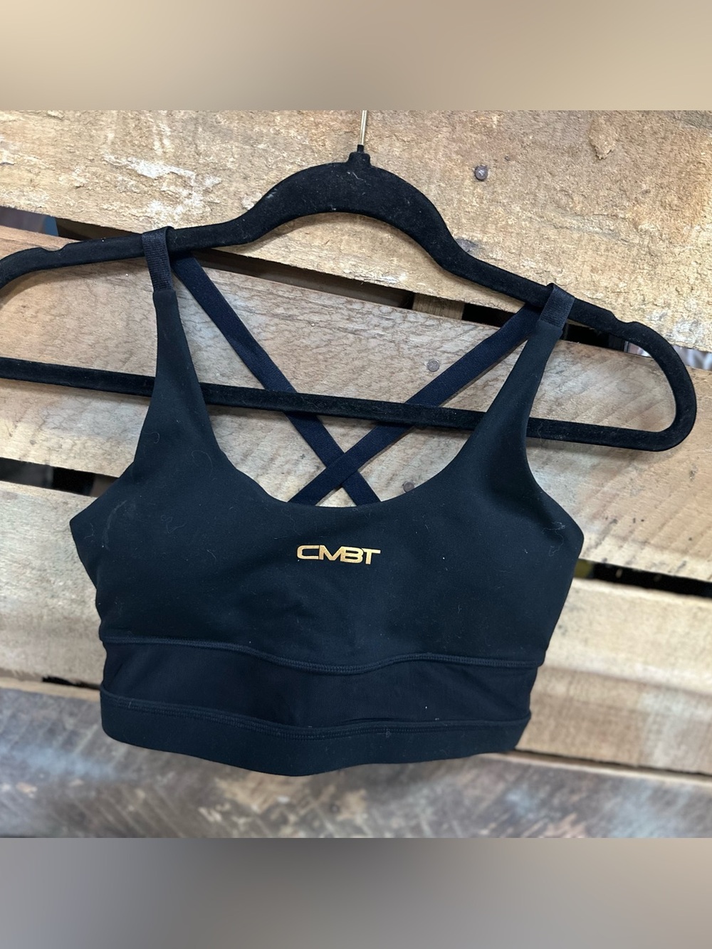 CMBTIRN luxe Black Crisscross Sports Bra with Gold Logo and mesh details